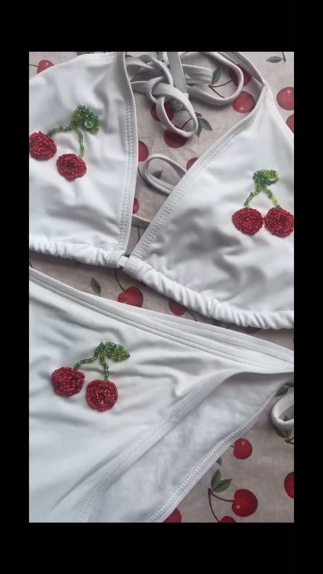 Add a touch of juicy glamour with this hand-beaded cherry bikini 🍒✨ Carefully crafted with shimmering beads and bold cherry details, this unique swimsuit is perfect for beach days, poolside lounging, or standing out at summer festivals. Featuring intricate hand-beading and a flattering silhouette, this bikini is a one-of-a-kind statement piece that blends playful charm with handmade luxury.

#LTKSwim #LTKSummerEdit