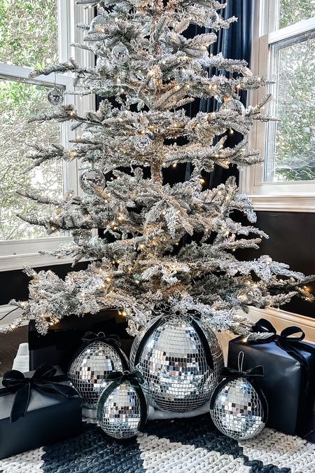 Black Christmas. Disco ball decor. Mirror ball decor. Christmas decor. Interior design. Christmas tree. Flocked Christmas tree

#LTKstyletip #LTKHoliday #LTKhome