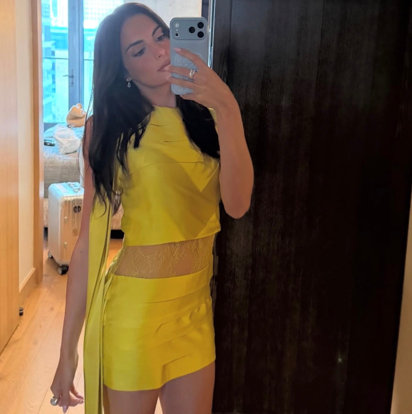 Paige Desorbo 
I heart radio awards
Podcast awards
Giggly squad
Yellow dress
Ferragamo
