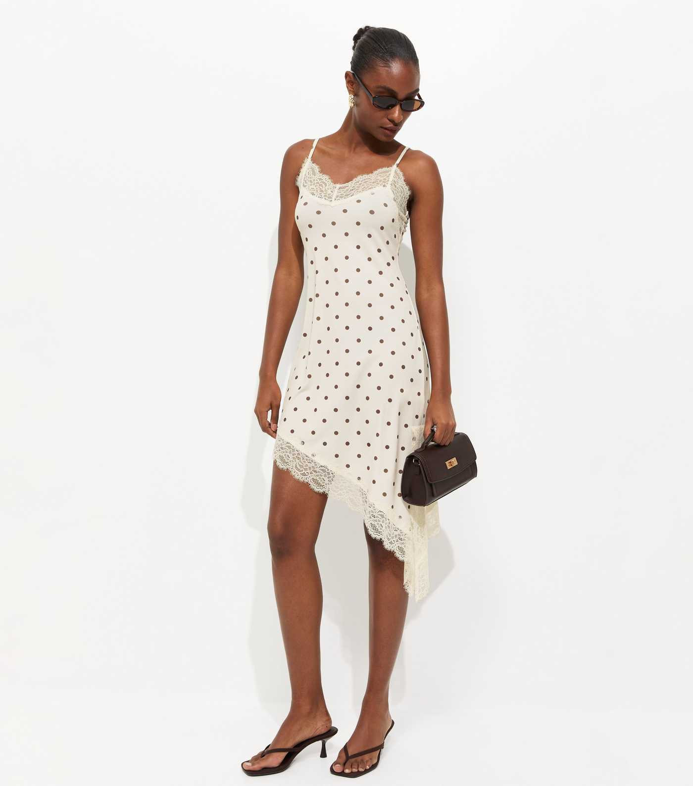 White Polka Dot Asymmetric Hem Mini Dress | New Look | New Look (UK)