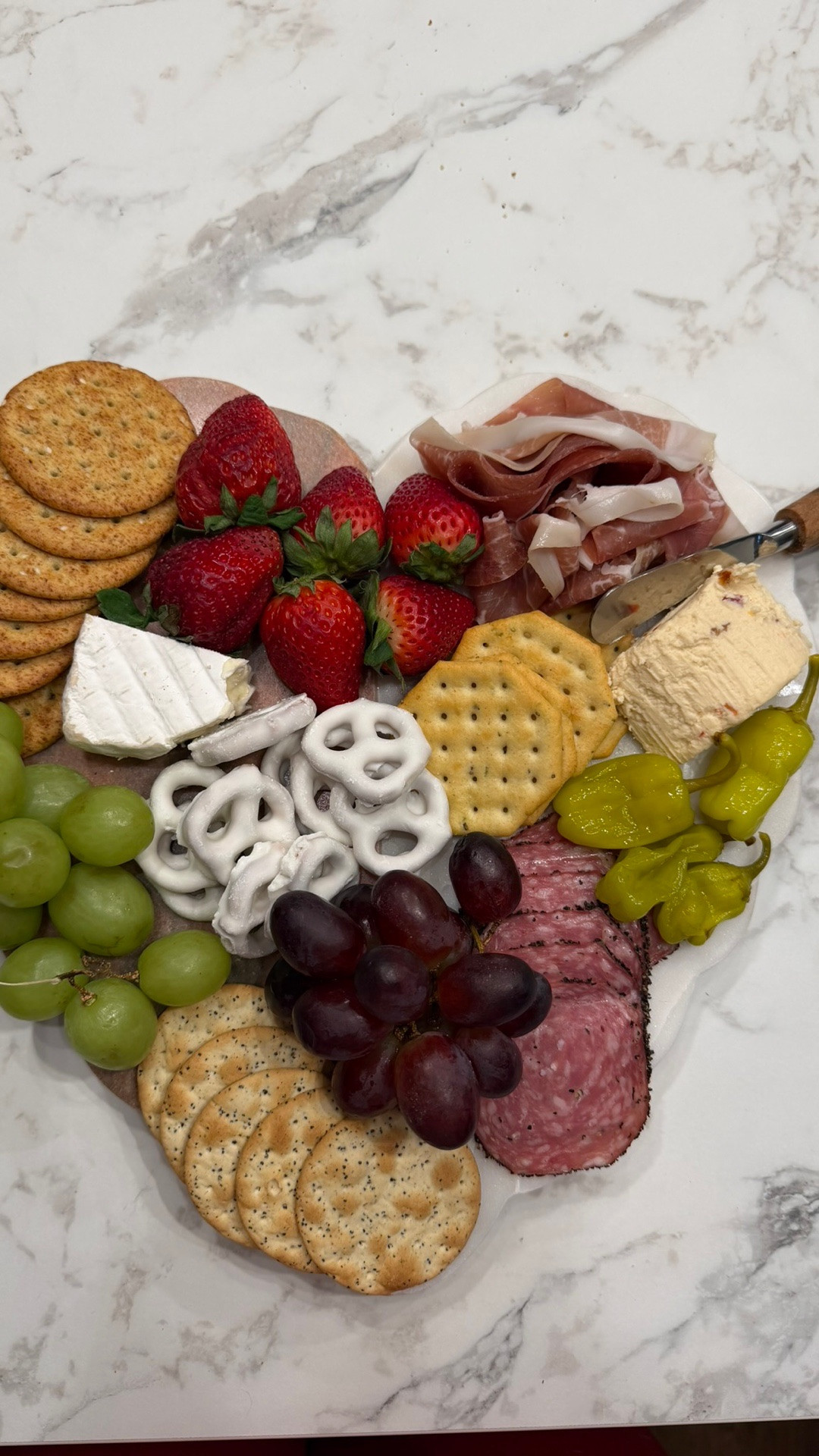 At this point, a charcuterie board hate to see me coming! 🧀🍇 it’s my favorite thing right now! Butter zip up and yoga pants set from @Target. 

#LTKfoodie #LTKValentine