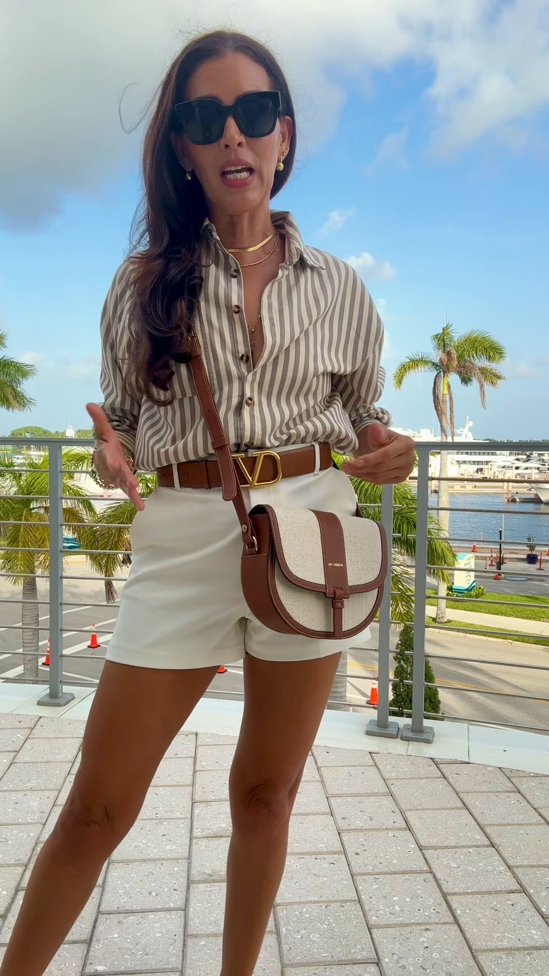 Lip combo: pink toffee + deep taupe lipliner. Size S in shirt, is oversized! Size 4 in shorts, on sale now. Sunnies too! Valentino belt is black/brown. Shoes tts. 

#LTKSeasonal #LTKOver40 #LTKSaleAlert