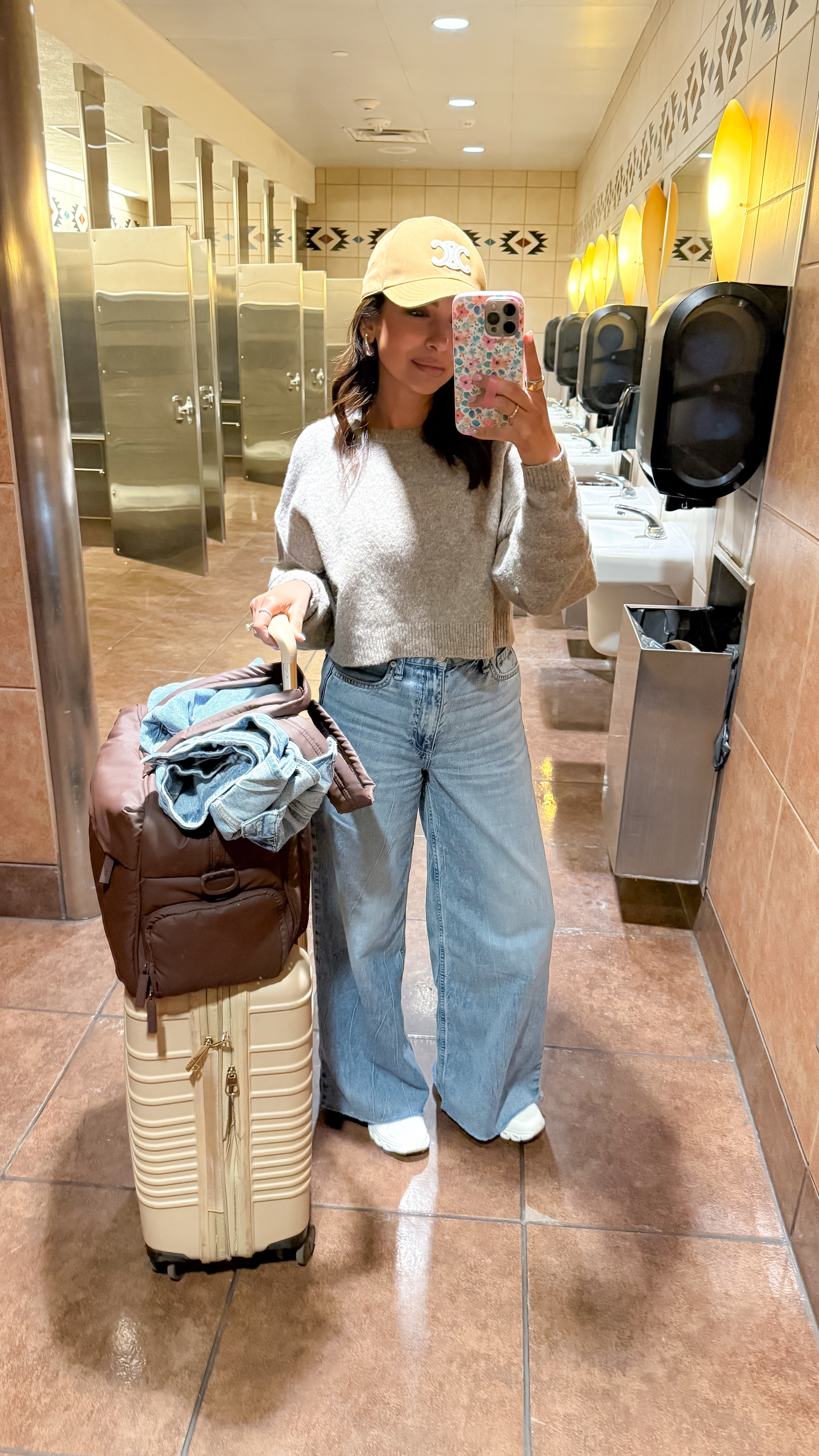 Quick change for our flight home, jeans are so comfy you can even travel in them. Super lightweight & soo soft! Size down if between sizes, I'm in 24. Hat is Celine, linker a similar option

#LTKTravel
