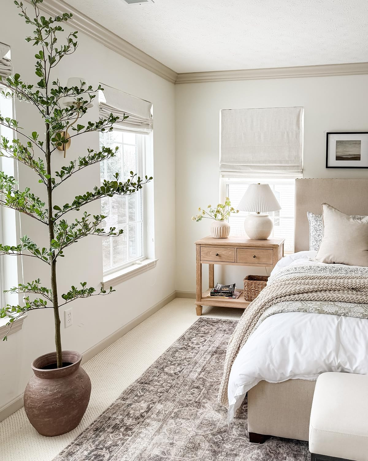 Can't beat this black olive tree for the price! I used an old vase and it's perfect in our bedroo... | Amazon (US)