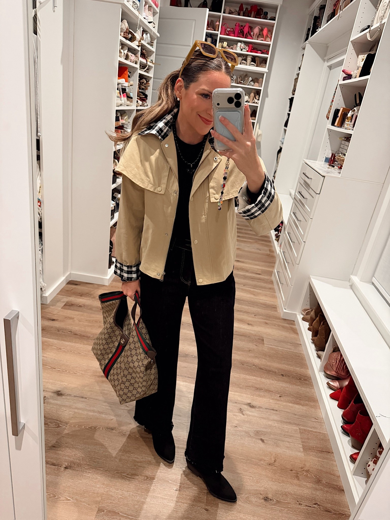 In a small gingham trim khaki cropped coat, medium bodysuit, size 10 jeans, ankle boots and accessories - fits tts.

#LTKSeasonal #LTKootd #LTKFindsUnder50