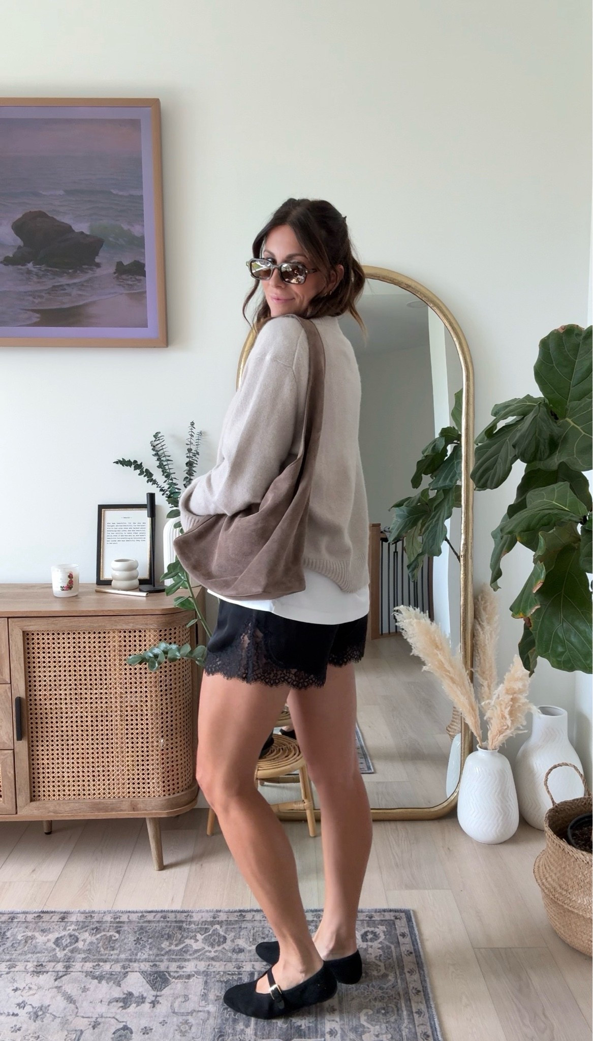 End of summer ootd idea 
Silk shorts are from Aritzia size small
T-shirt and Aritzia size small
Shoes are old from Steve Madden
Sweater is from @Quince 
Bag is also from￼Quince
Amazon sunnies