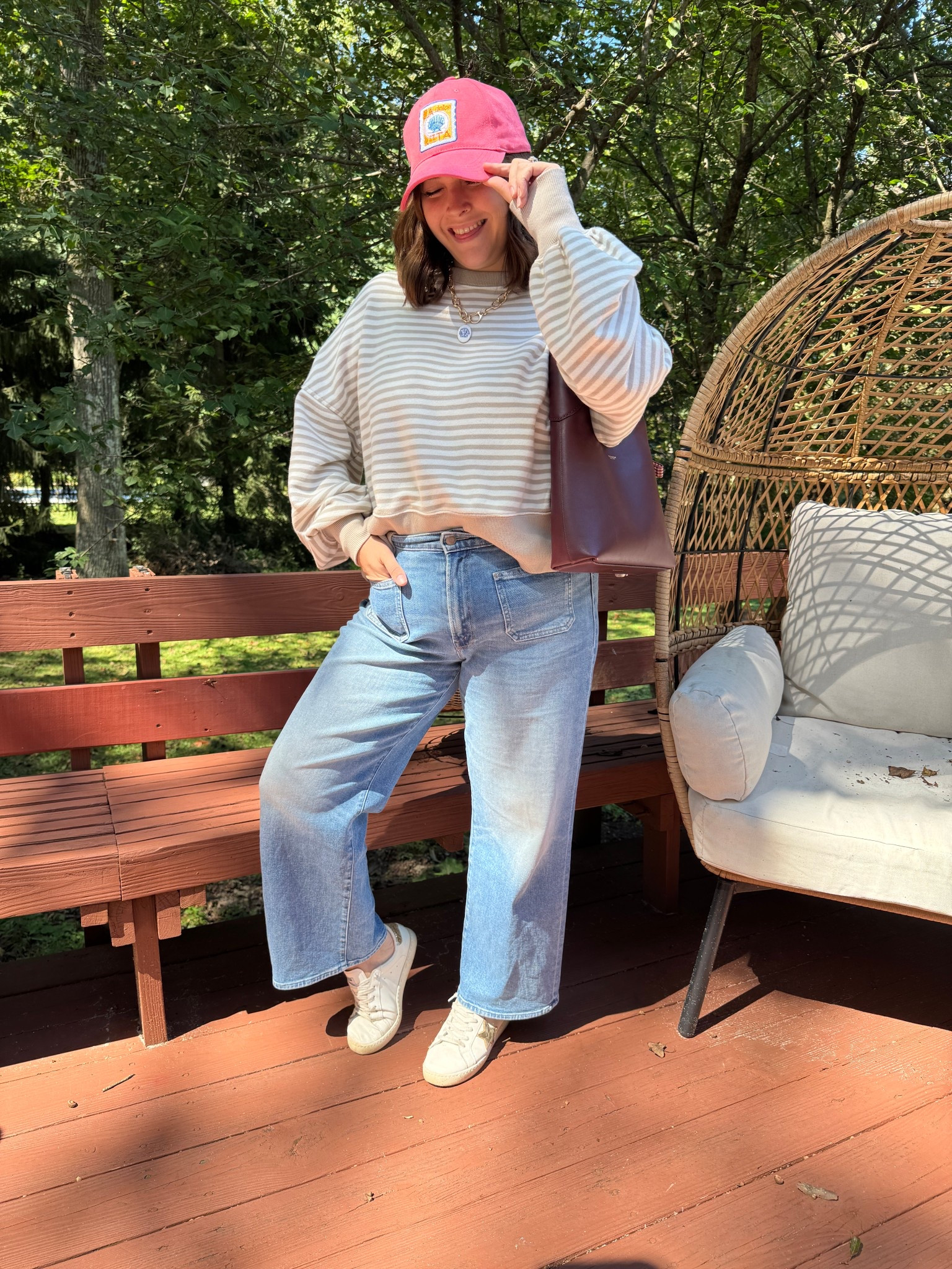 I felt so pretty and cute in this casual fall outfit today! I’ve never been more in love with a pair of wide leg jeans. MOTHER is pricey, but the best jeans I’ve ever worn. So glad I grabbed these. They run TTS.

My cropped striped sweatshirt is still in stock in a few colors. I’m wearing a medium. Sized down 1 

#LTKSeasonal #LTKCon #LTKSaleAlert #LTKMidsize