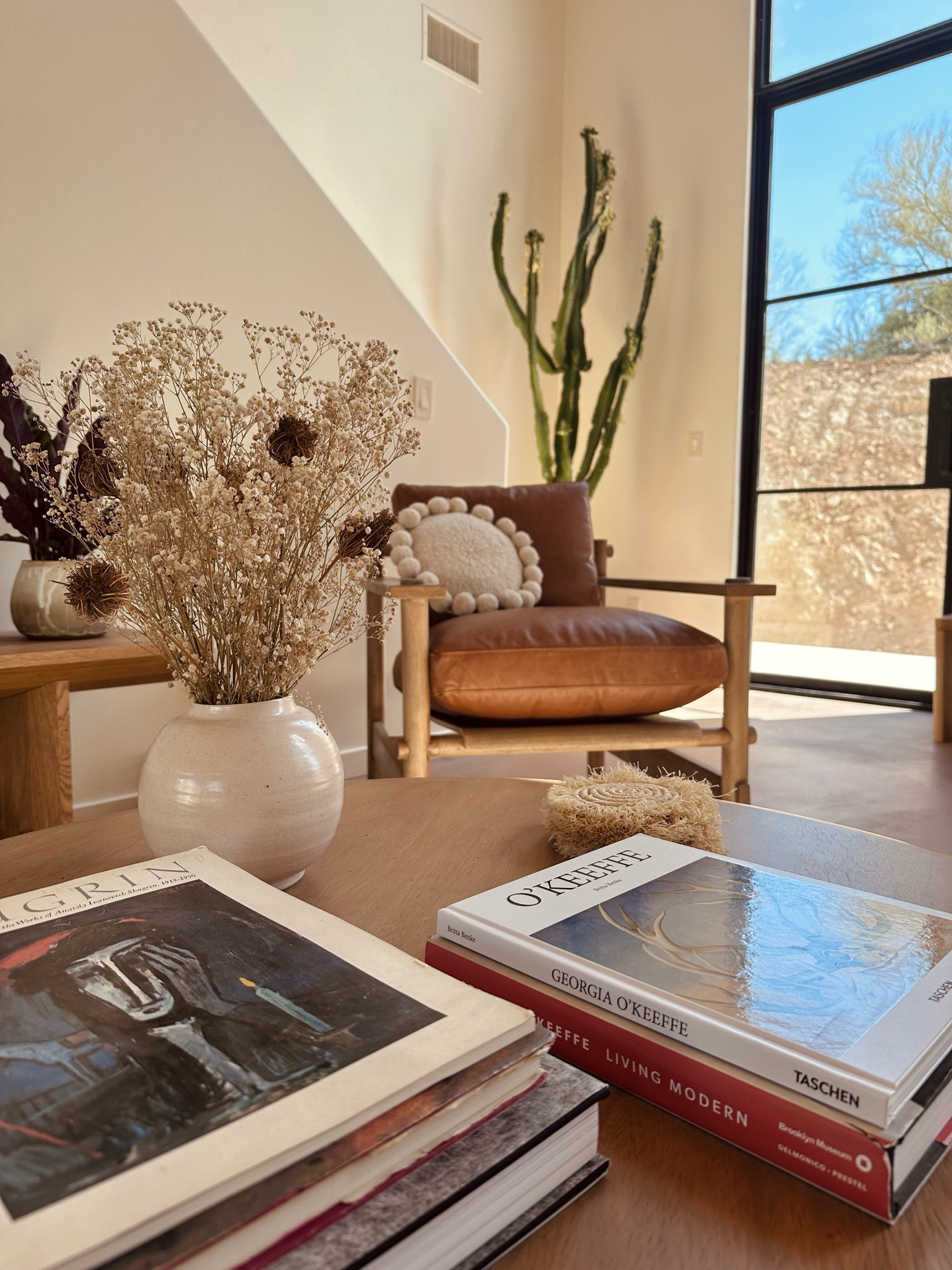 Neutral living room furniture and decor - round coffee table - southwest living room - bohemian living room - home design 

#LTKstyletip #LTKhome