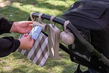 Ubbi Retractable On-the-Go Bag Dispenser for Baby Travel, Diaper Bag Accessory Must Have for Newb... | Amazon (US)