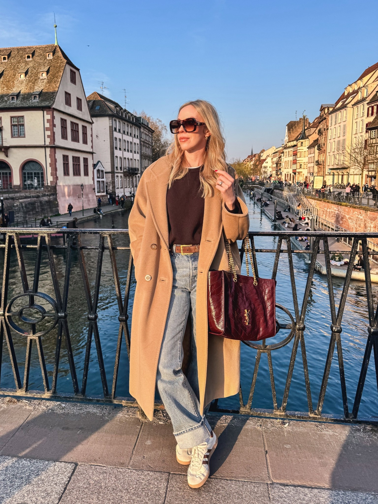 European vacation outfit, travel look, Max Mara camel coat, @Levi's baggy 90’s jeans, YSL suede belt, Adidas Samba sneakers, burgundy YSL tote bag 

#LTKTravel #LTKOver40 #LTKSeasonal