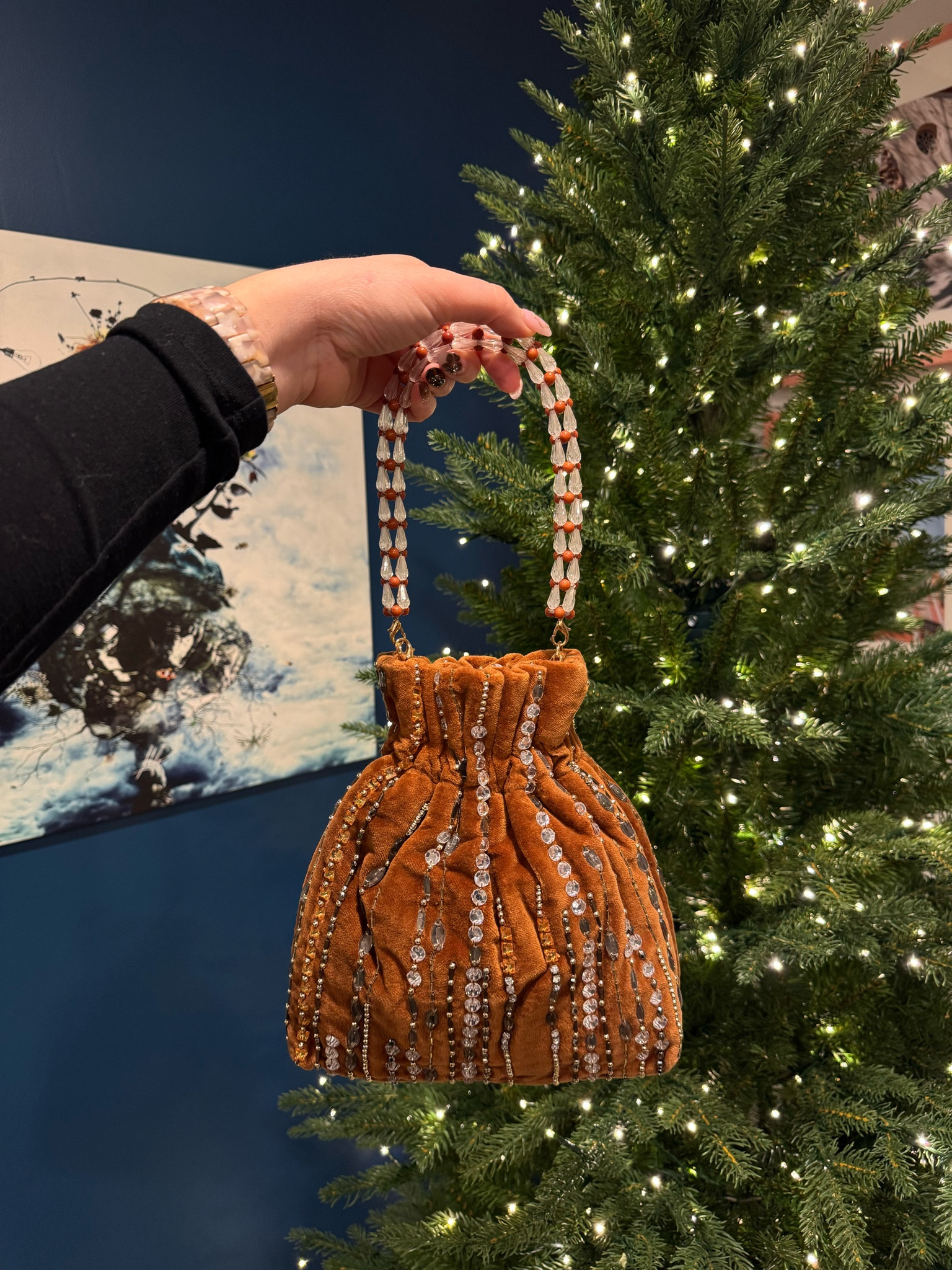 This Anthropologie suede and rhinestone bag is even cuter in person! Can’t wait to use it. Currently 30% off. Holiday outfits, perfect for any girl on your shopping list. Gifts for her, gift guide

#LTKItBag #LTKGiftGuide #LTKHoliday