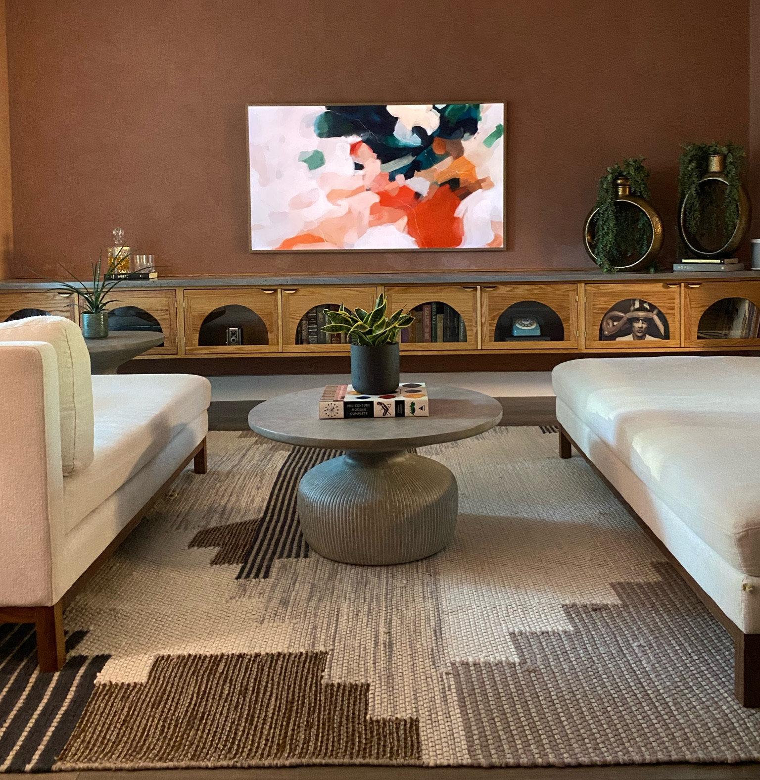 DIY home improvement turned out amazingly in this living room makeover. Technology upgrade with Samsung Frame TV, soft tread rug courtesy of west elm, and a one of a kind floating entertainment center. 

#LTKhome