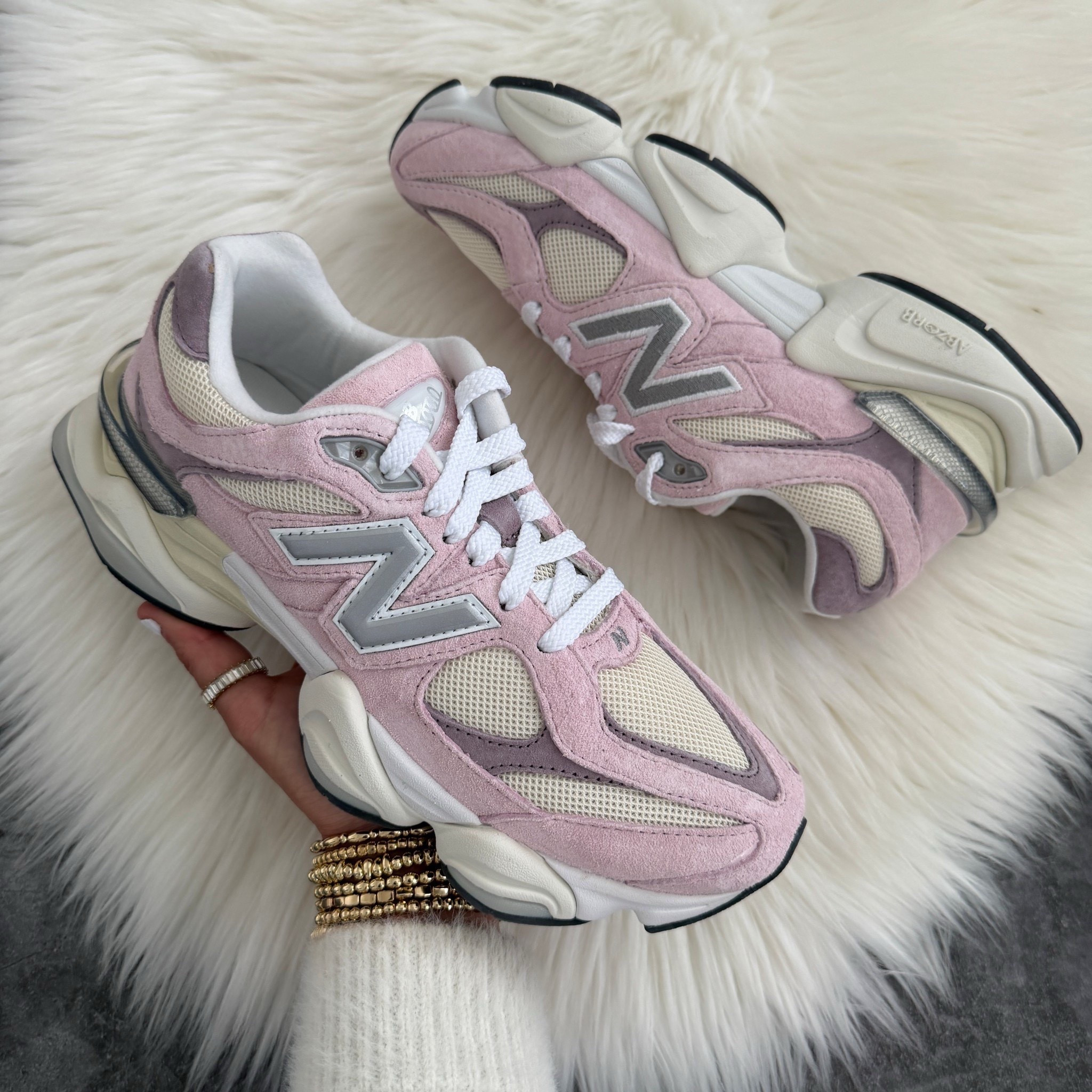 New Balance 9060 sneakers run 1/2 size big. Color: rose sugar with angora and ice wine