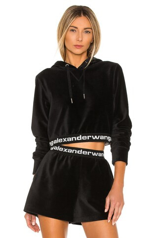 Alexander Wang Stretch Corduroy Cropped Long Sleeve Hoodie in Black from Revolve.com | Revolve Clothing (Global)