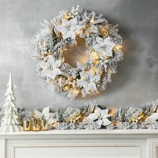 24 in. D Pre-Lit Snow Flocked Greenery Pine Poinsettia Artificial Christmas Wreath, with 50 White... | The Home Depot