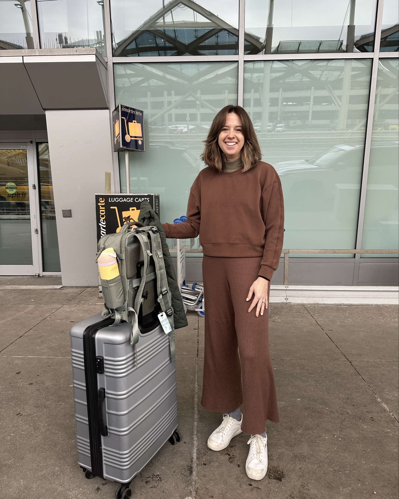 GUYS!!! Please look! This sweatshirt is super similar to the air essentials and the pants are Amazon basics and the colors MATCH PERFECTLY. This is the perfect lounge set but elevated enough that when I land and meet up with work folks I still look put together. I am obsessed!! Plus my green jacket! I am so proud of myself for this outfit 😂

#LTKWorkwear #LTKTravel #LTKActive