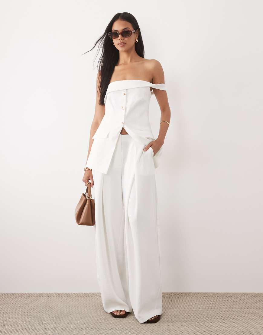ASOS DESIGN Tailored floaty deep pleat horseshoe pants in white | ASOS (Global)