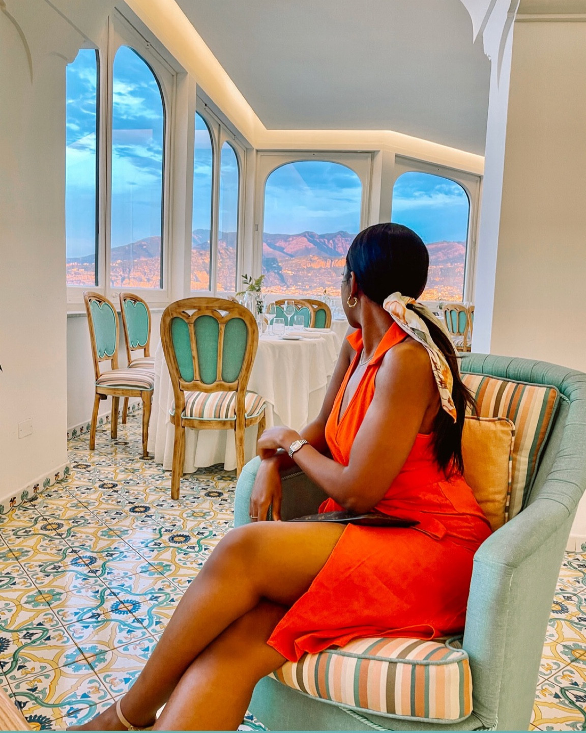 Burnt orange dress with a hair scarf #italy - wearing size Medium but a Large would have been better for me

#LTKeurope #LTKtravel #LTKunder50