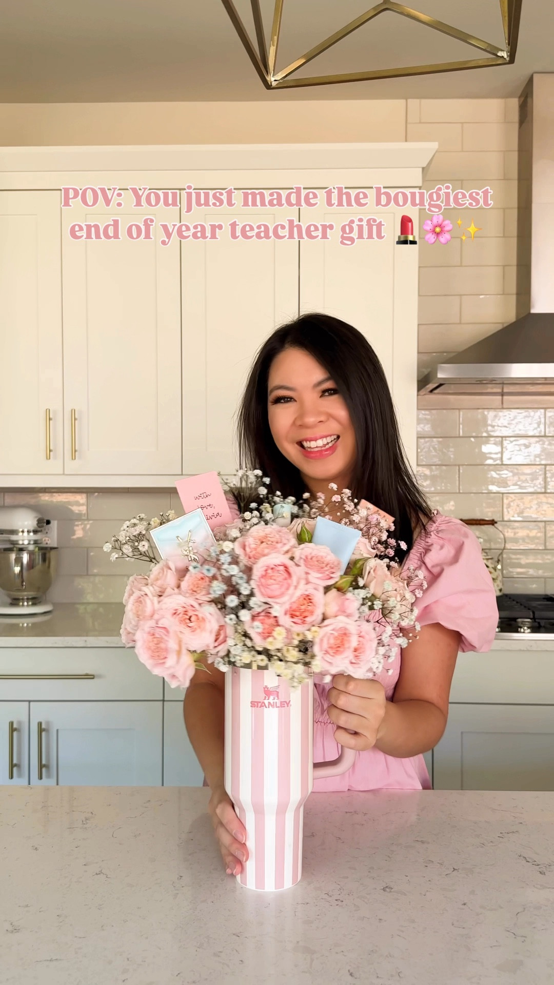 I just made the most over the top end of year teacher gift! I love the striped peach Stanley quencher! Added flowers from Trader Joe’s and beauty products like sunscreen and YSL makeup taped on skewer sticks. Sooo cute and I want this pink summer gift for myself 😂 

#LTKSummerEdit #LTKGiftGuide #LTKHome