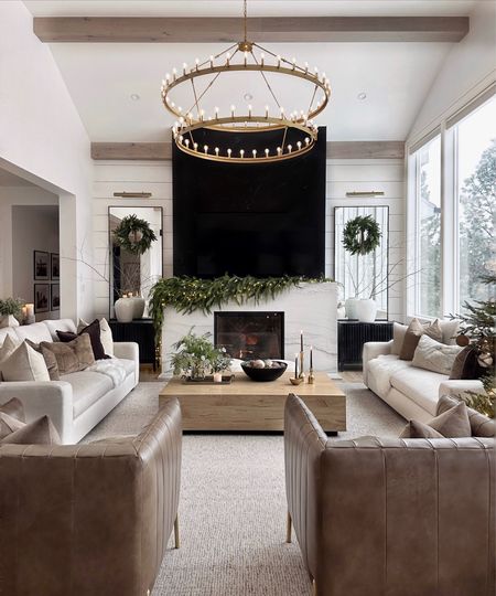 Cozy vibes. I cannot wait to spend the next couple weeks cozied you here eating holiday treats and watching Christmas movies!

Family room. Sofas. Coffee table. Chandelier. Oversized mirrors

#LTKhome #LTKHoliday #LTKstyletip