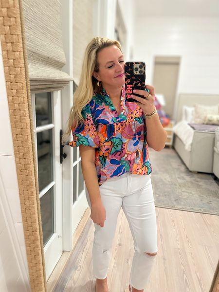 Loving this fun top. The print or so perfect with all the pops of color!!! Wearing a small. True to size. Jeans are a size 26. Code FANCY15 for 15% off  

#LTKunder100 #LTKsalealert #LTKstyletip