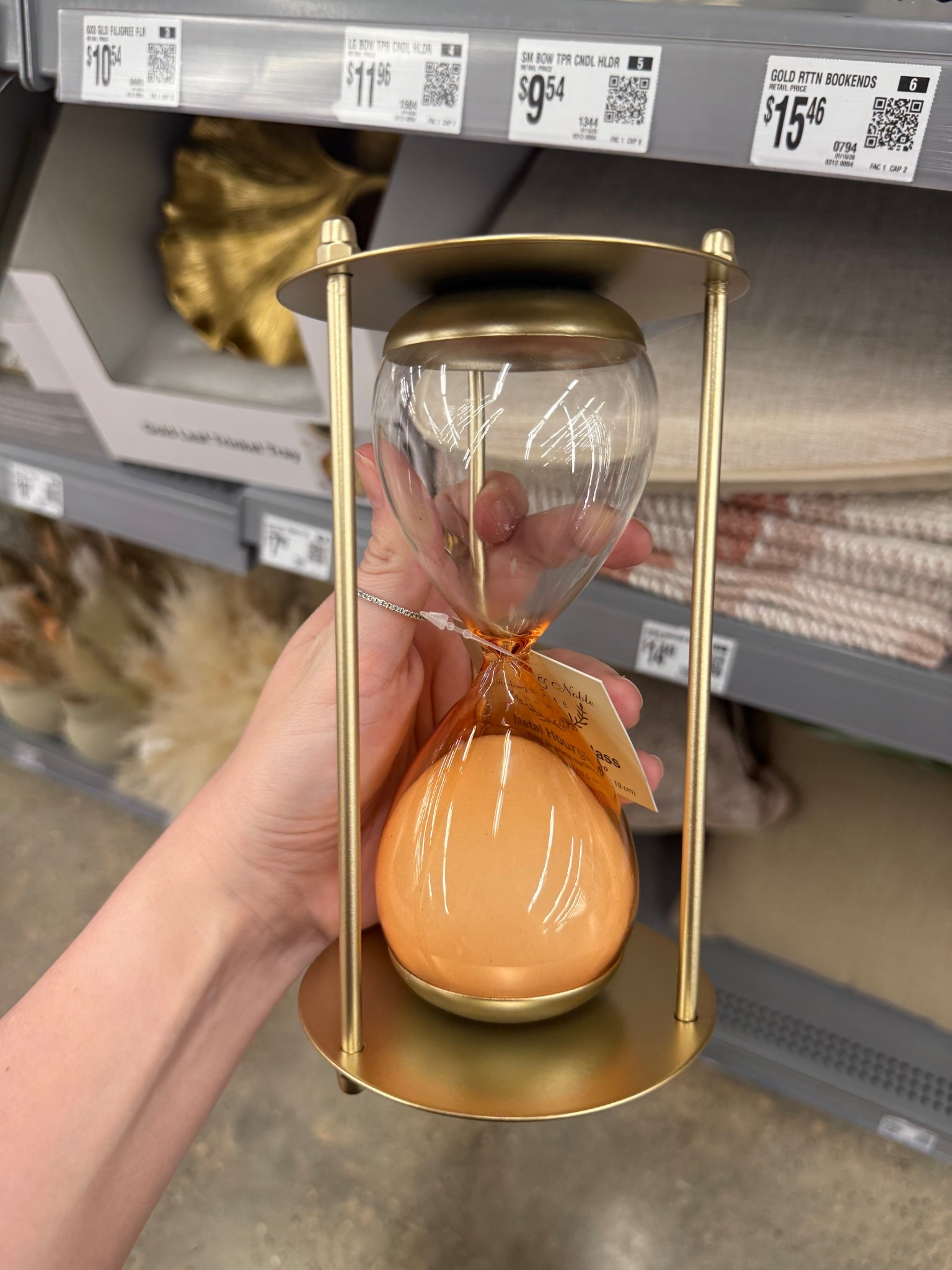 Gold hourglass from Walmart 

#LTKHome