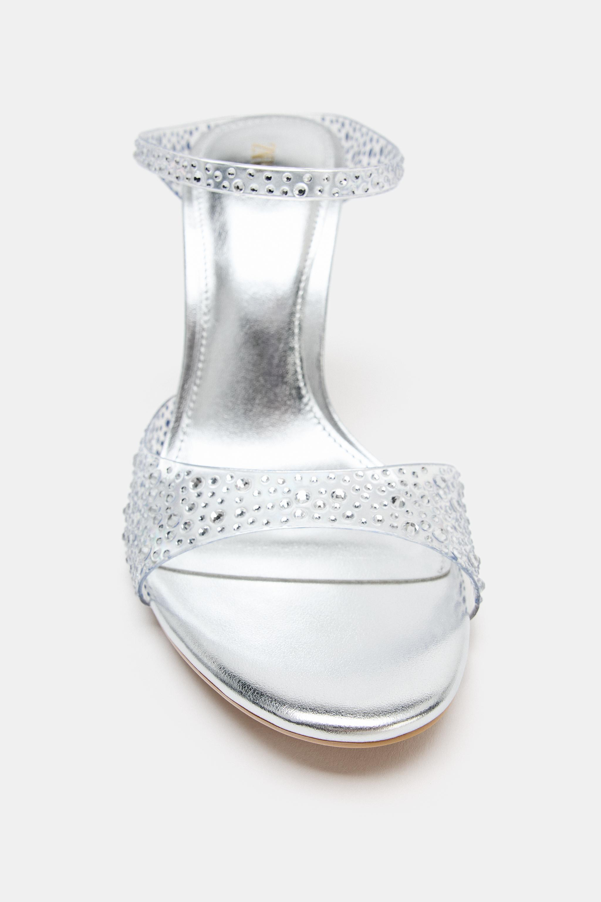 Slingback heeled sandals. Mule style. Metallic-effect insole. Vinyl-effect straps. Rhinestone det... | Zara US