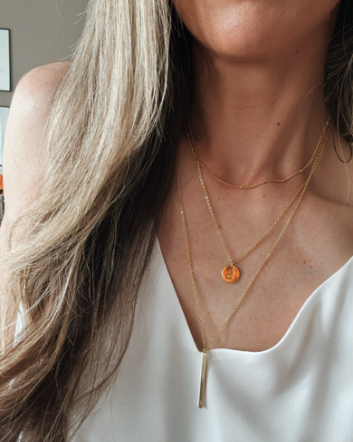 I can’t get over this under $20 layered initial necklace! The prettiest way to dress up a plain top!

summer top | tank top | layered necklace | summer jewelry 