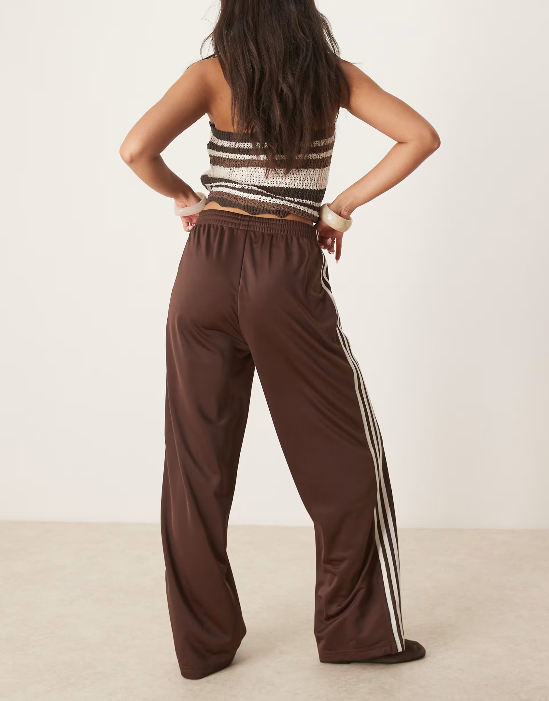 adidas Originals Firebird Loose track pants in brown | ASOS | ASOS (Global)