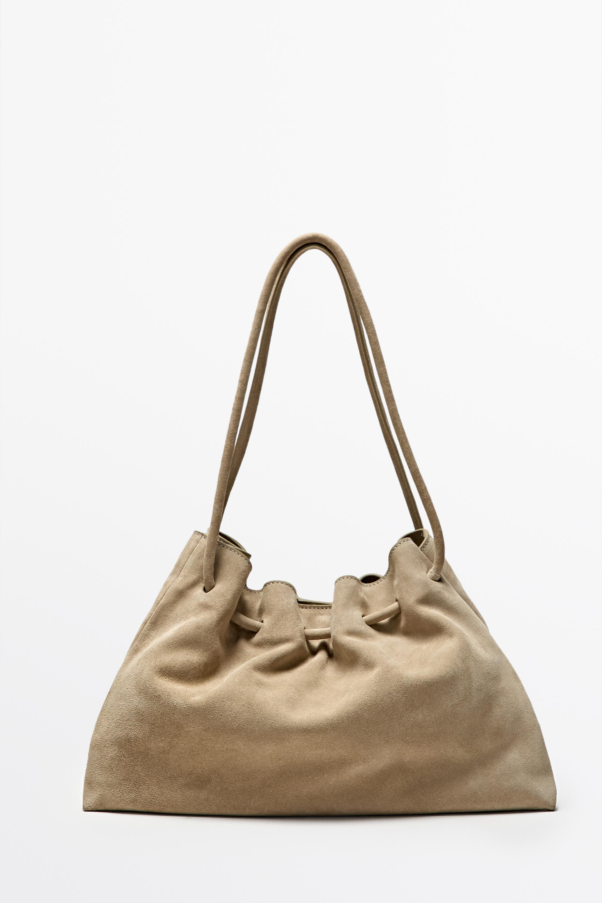 NEW VIEW LOOK
Ruched split suede leather bag

 £199  Colour:  Ecru  Add to basket Colour: Ecru|R... | Massimo Dutti UK