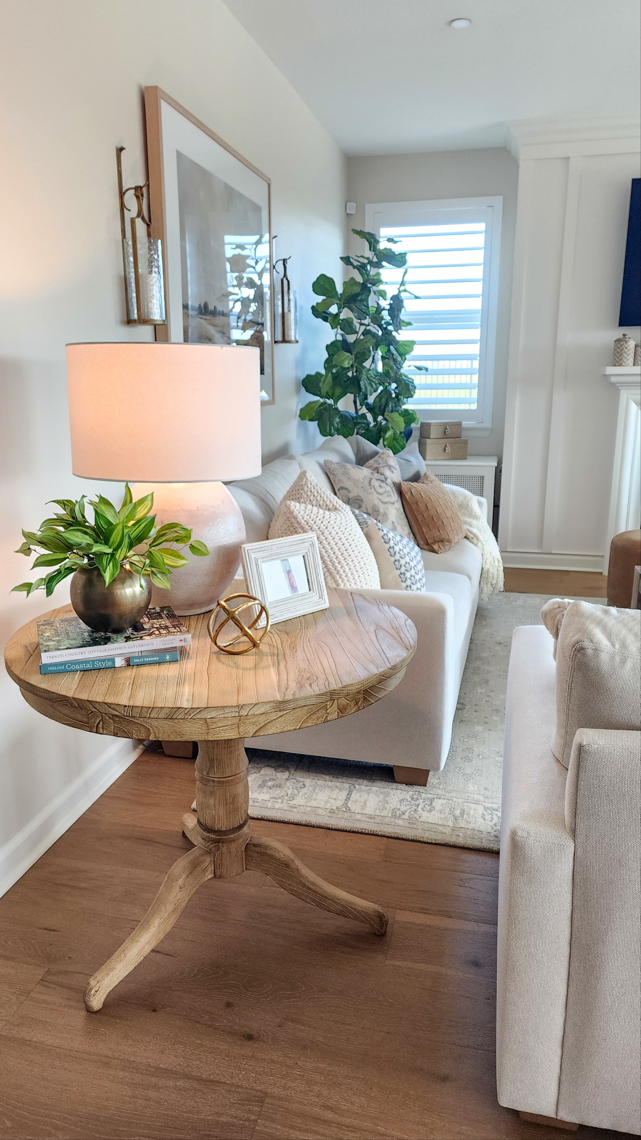 Beautiful Coastal style! The large round end table has such amazing coastal texture! Definitely a statement piece. 

#LTKHome