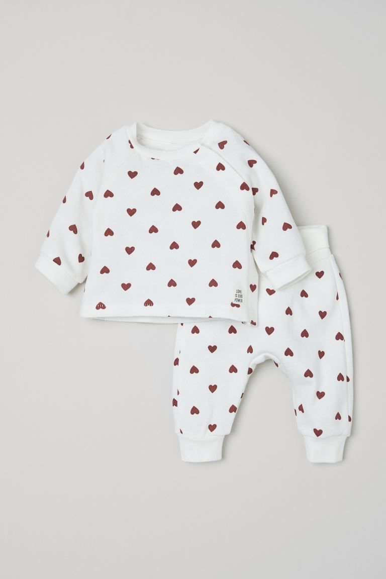 Set in soft cotton sweatshirt fabric. Top with off-center snap fasteners at front and long, ragla... | H&M (US + CA)