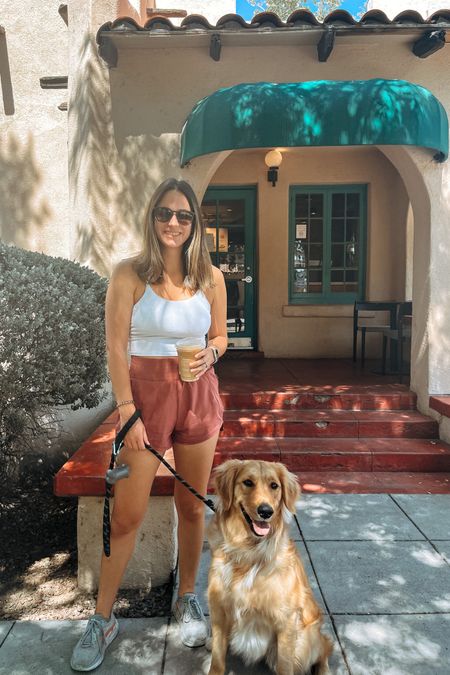 Loving this Amazon Outfit for our morning walk! These high waisted running shorts + cropped tank are a staple for me this summer! Both come in so many fun colors and are both prime! Top runs a bit small so I recommend sizing up! 
Top: large // Shorts: small // Shoes: 8

#LTKstyletip #LTKtravel #LTKFitness