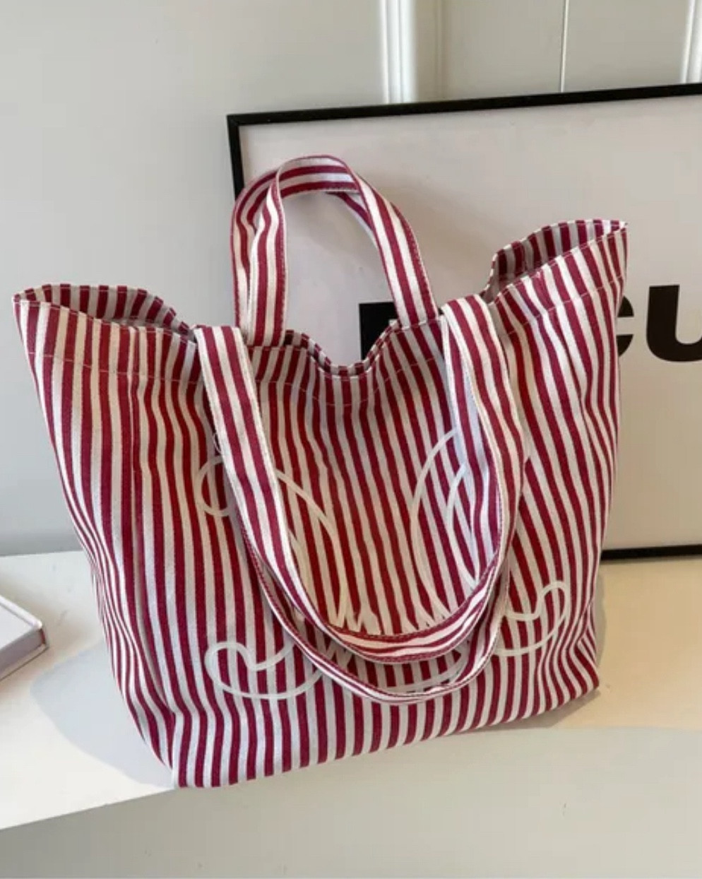 Stripped Celine beach bag. Comes in 2 sizes, a large and a small bag  

#LTKbag #LTKsummer #LTKsale