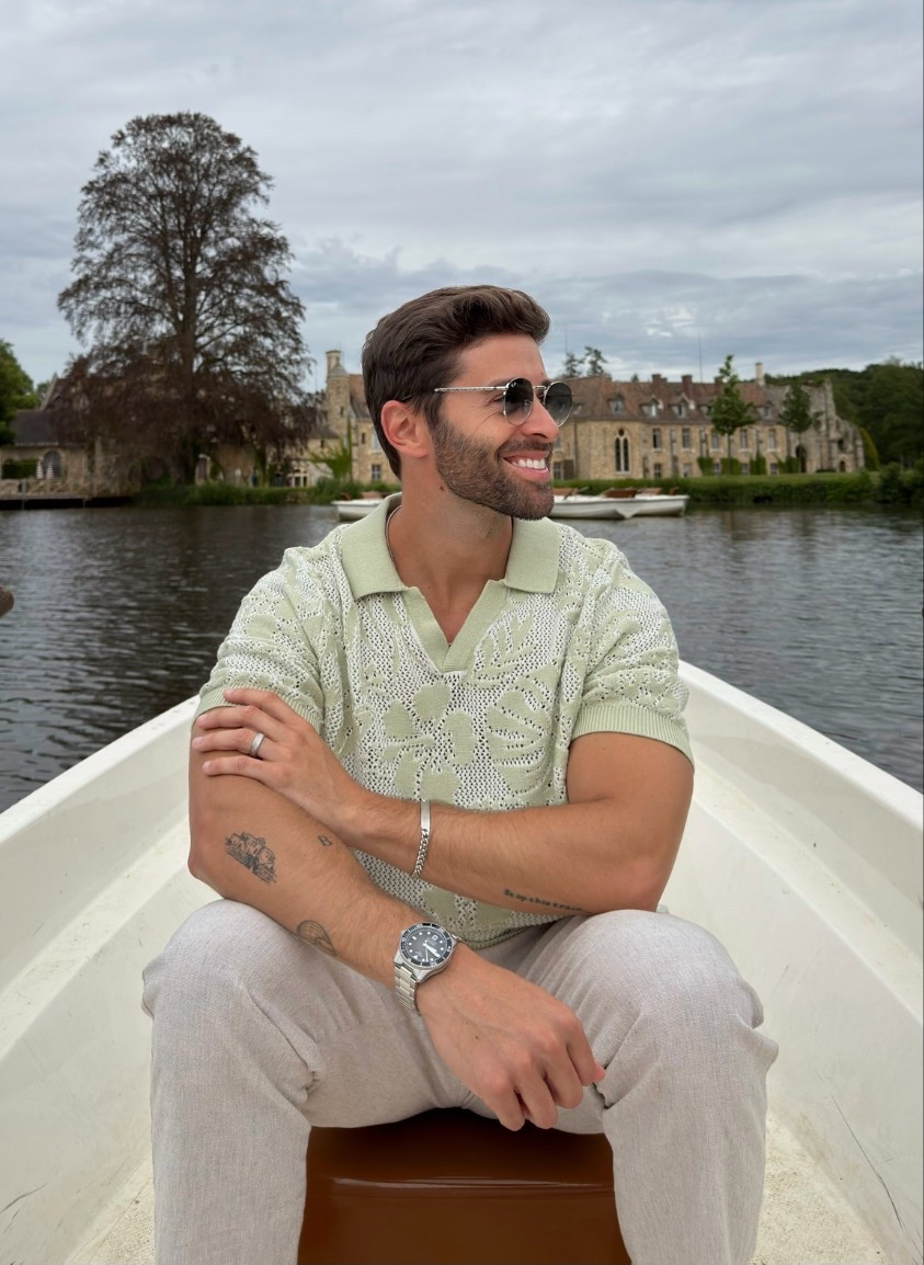 Green mens polo with khaki linen pants