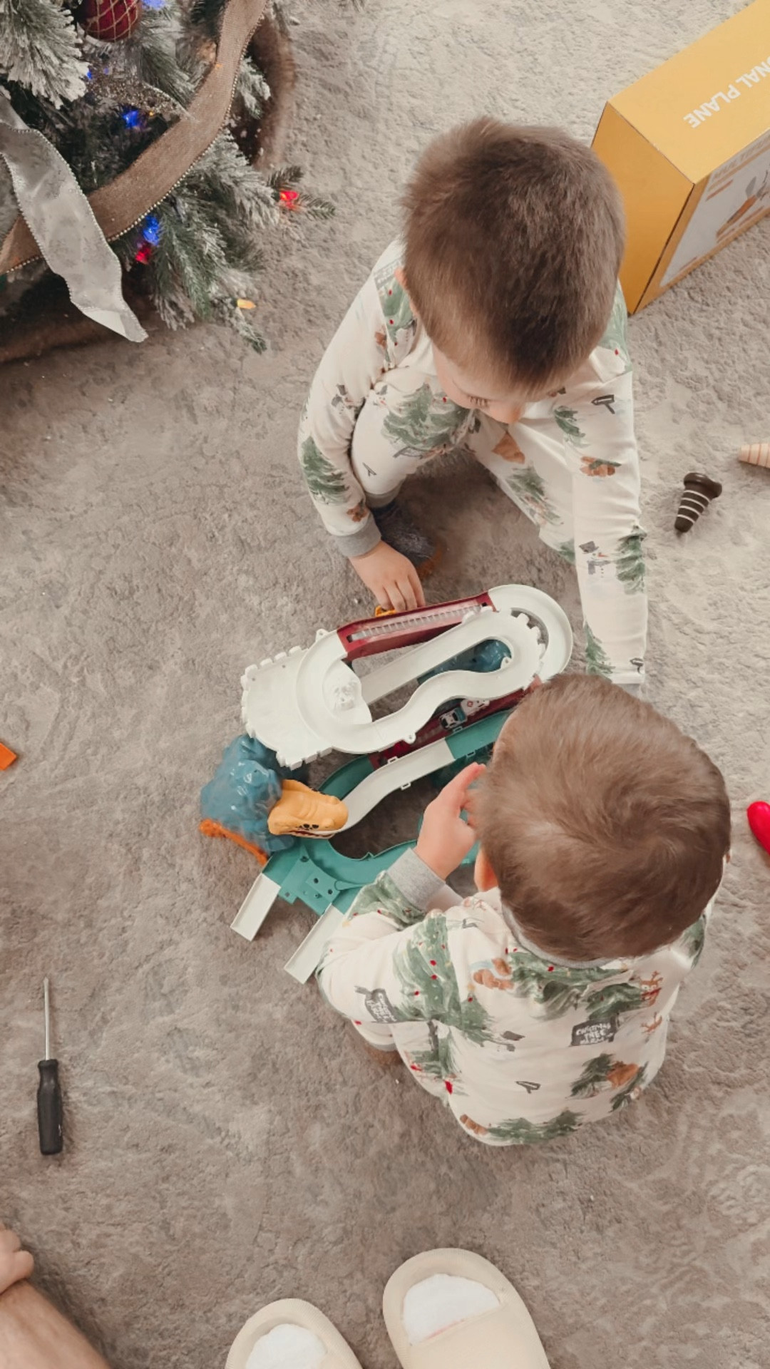 Boys playing with their new dinosaur race track wearing their Christmas pajamas !

#LTKHoliday #LTKKids #LTKGiftGuide