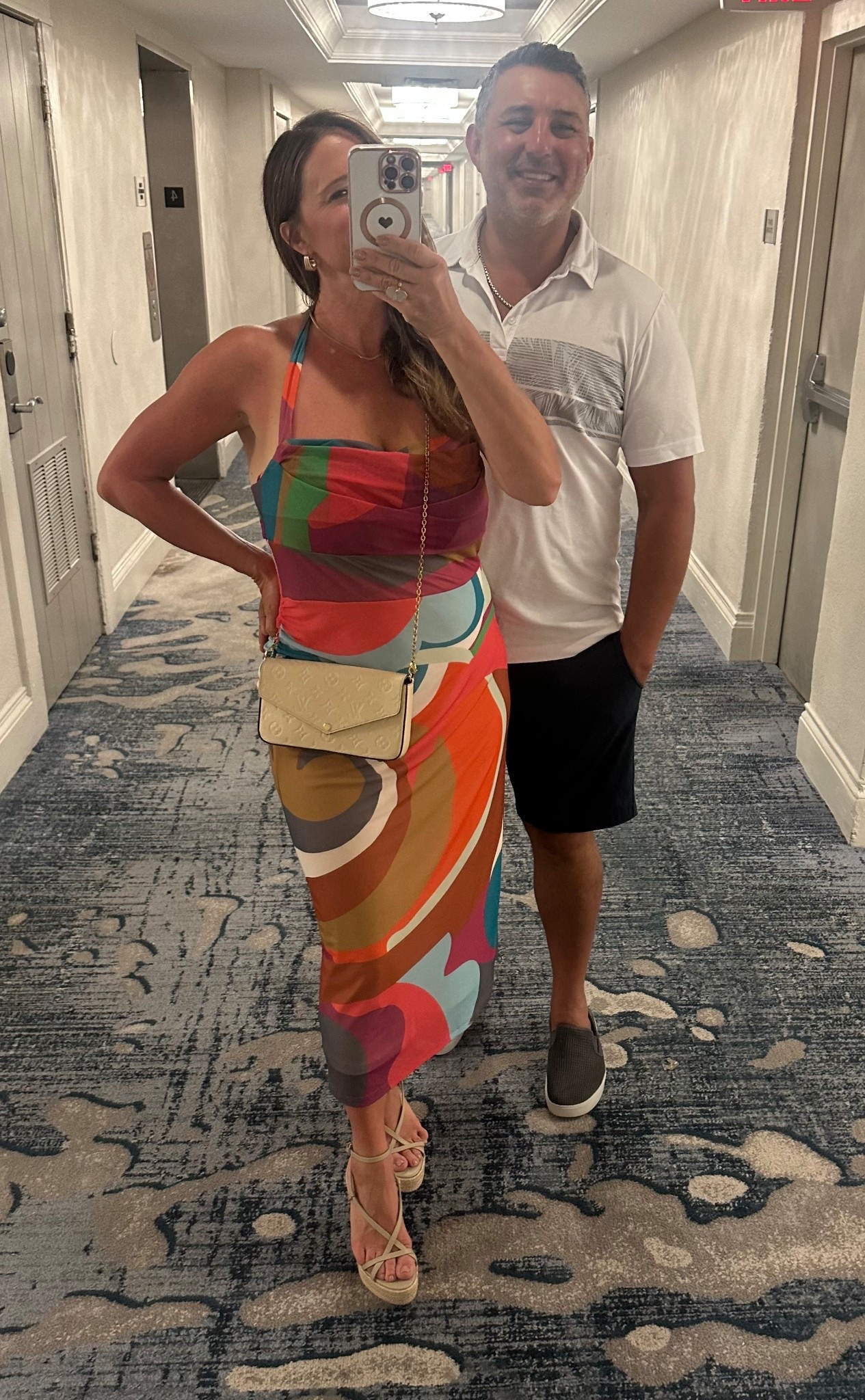 Price drop of the dress and shoes! Wearing a large in the dress. Dress is a slip over , 95% polyester. Machine washable. 