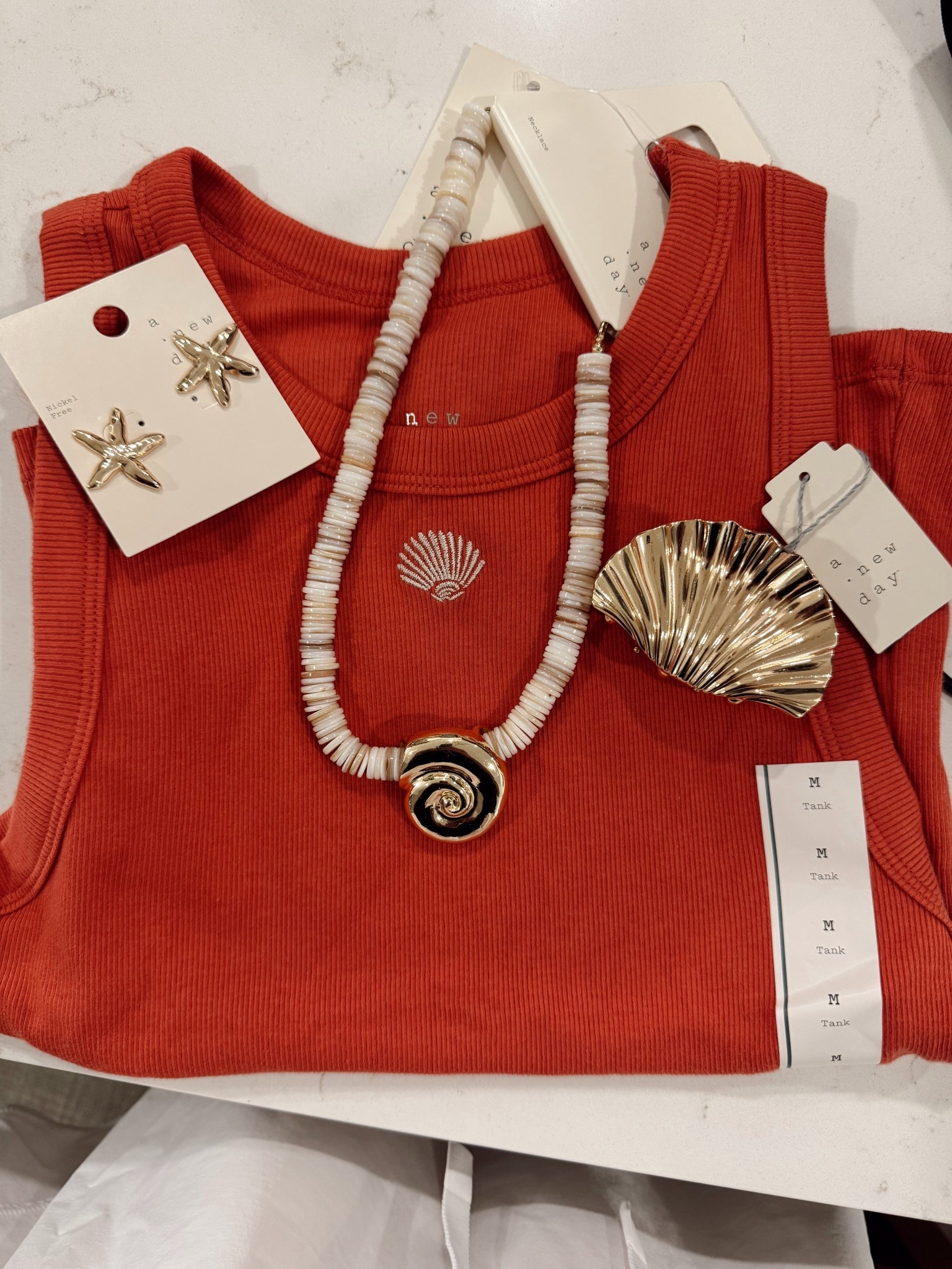 Target, jewelry and tanks. I am loving lately. All under $20. 