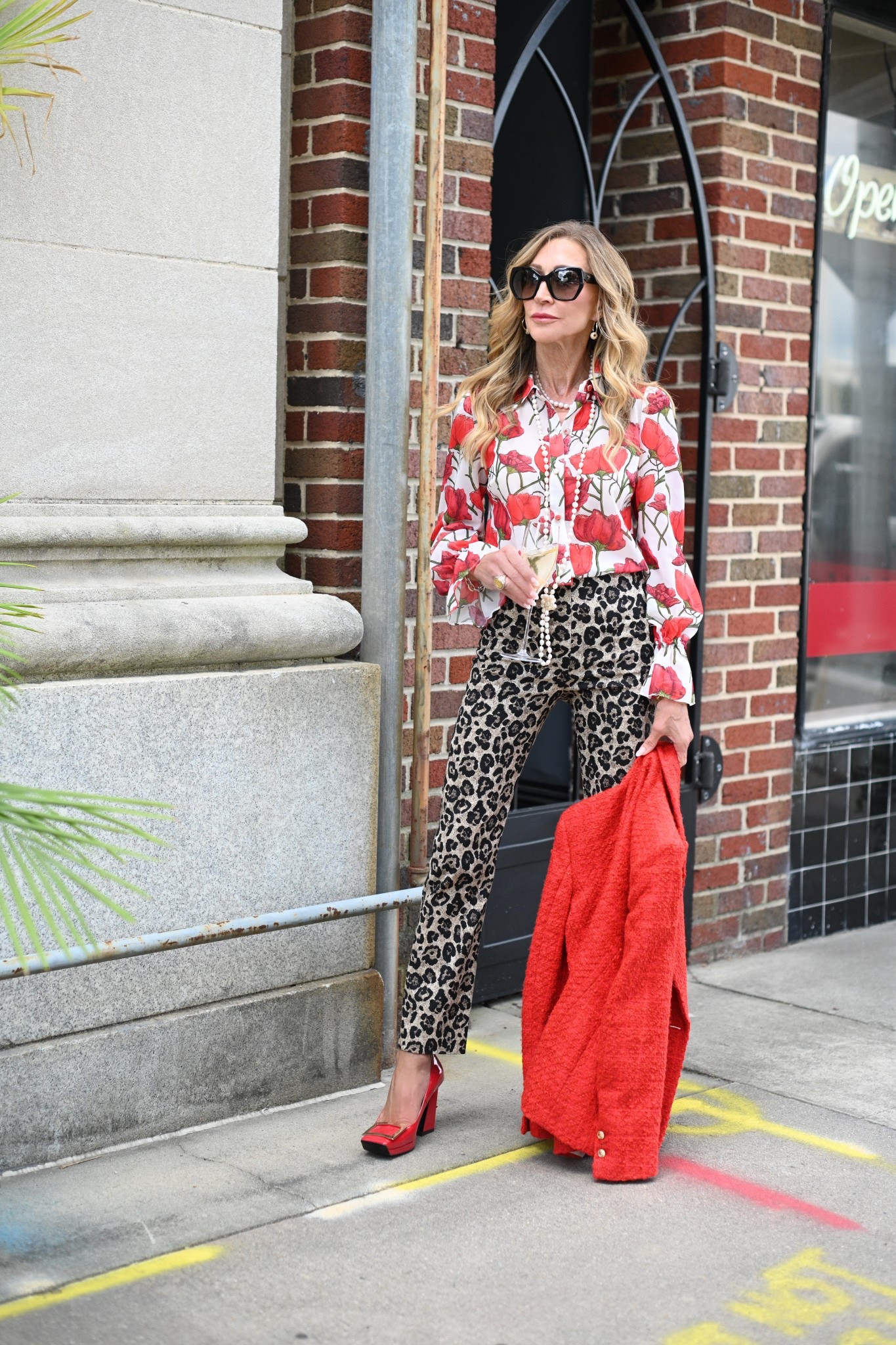 Bold and sassy look featuring a sheer blouse with red poppies from Milly, leopard pants from Sezane, a red blazer,  red patent leather pumps and a long strand of pearls!


#LTKSeasonal #LTKShoeCrush #LTKStyleTip