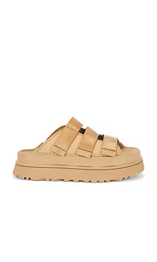 UGG Golden Glow Slide in Dark Sand from Revolve.com | Revolve Clothing (Global)
