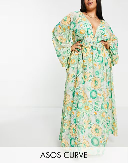 ASOS DESIGN Curve soft shirred waist open back maxi dress in green floral window.asos.performance... | ASOS (Global)