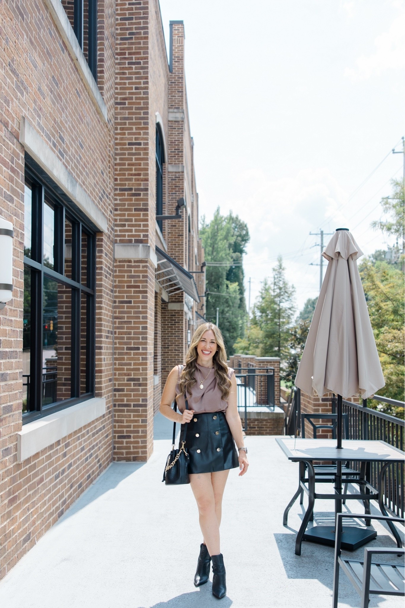 This blouse transitions so well into fall and is so versatile. Size small.