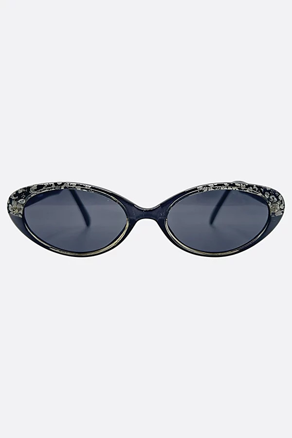 Giant Vintage Sunglasses Giant Vintage Sissy Slim Oval Cat-Eye Sunglasses in Charcoal Shimmer, Women's at Urban Outfitters | Urban Outfitters (US and RoW)
