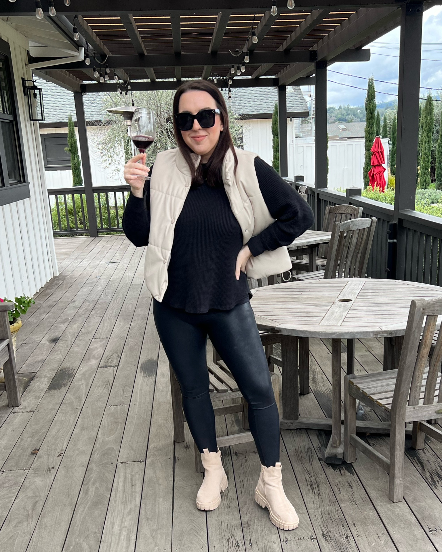 Winter outfit / faux leather leggings / beige puffer vest / waffle shirt / beige ankle boots / midsize outfit 

#LTKshoecrush #LTKmidsize #LTKMostLoved