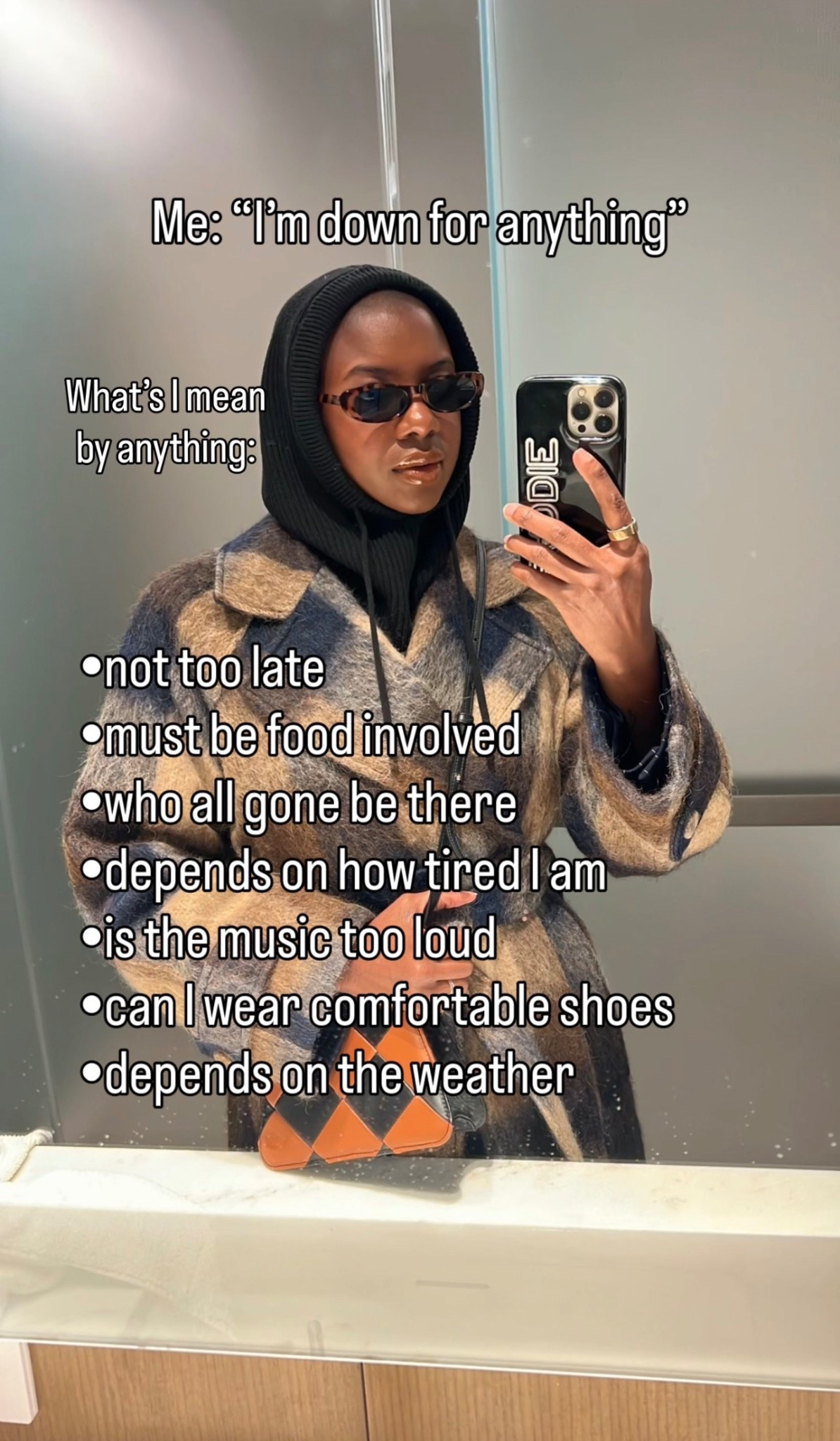 Winter outfit for New York travel! Navy and brown plaid coat, black balaclava for cold temps! 

#LTKdayinmylife #LTKootd