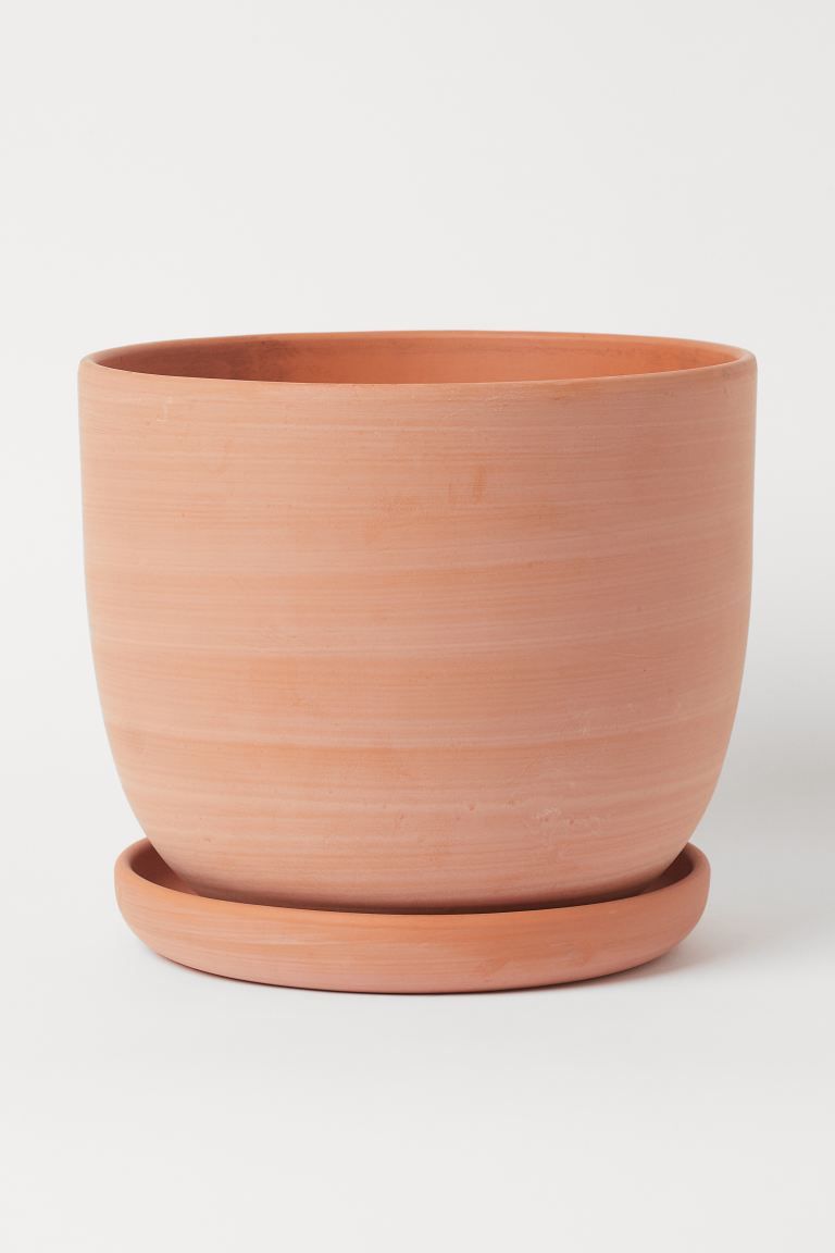 Plant pot in terracotta with a drainage hole at base. Matching saucer. Height 9 in. Diameter at t... | H&M (US + CA)