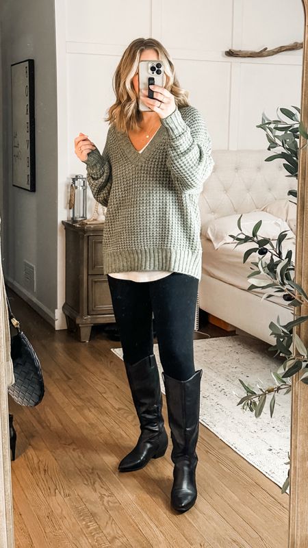 A layered looks for warmth but the subtle visibility of the white shirt adds contrast and interest. The sweater adds texture and it all feels relaxed and cozy yet looks chic and put together. Leave the pop of color to the top and stay monochromatic from the waist down to lengthen your legs visually and draw the eye up! Small tops, medium leggings  

#LTKstyletip #LTKworkwear #LTKmidsize
