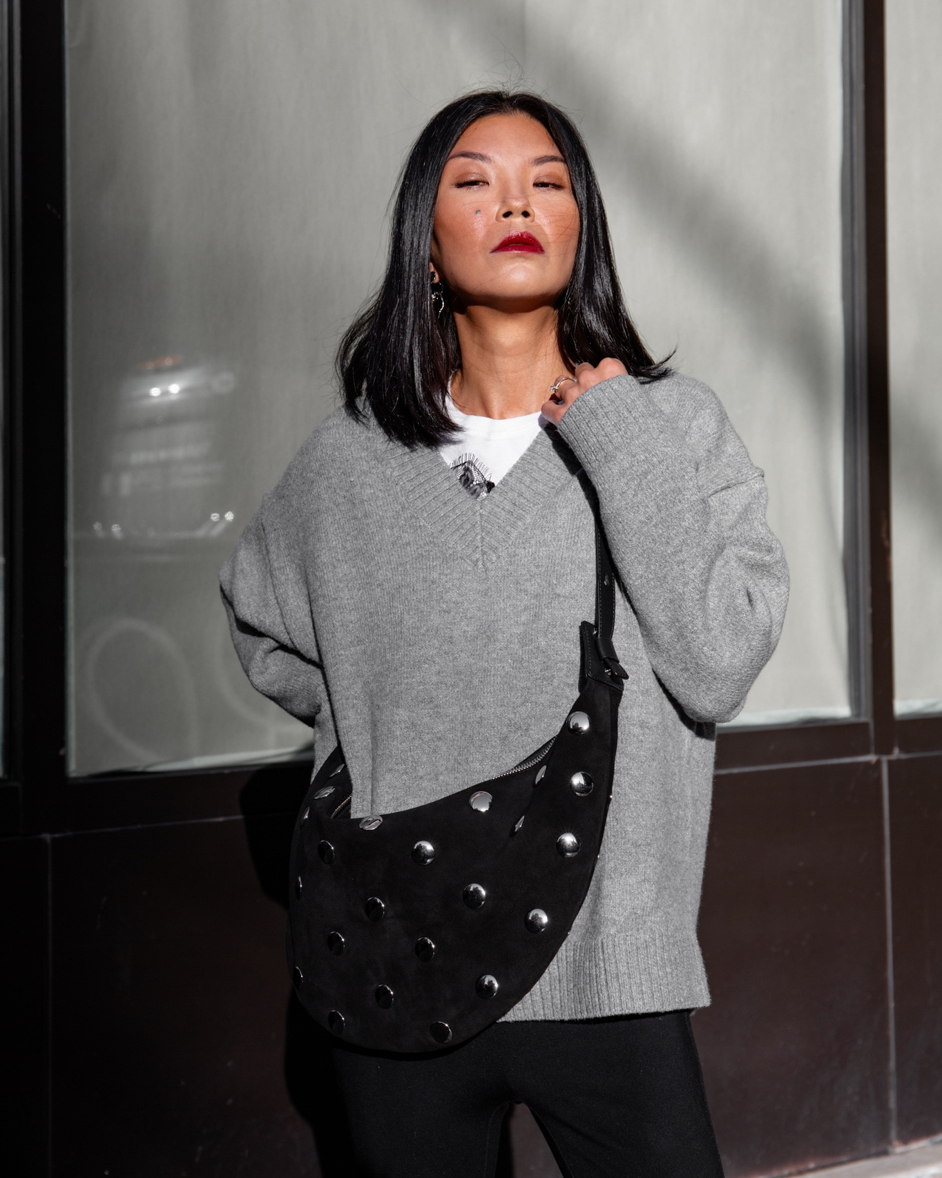 Styled with round metallic studs, we love the edgy-meets-refined allure of this luxe suede hobo bag. Zip closure. Inside slit pocket. 18" x 12' x 1 1/2".

Online exclusive currently 40% off!
#hobobag #suedebag #ltkitbag #blackbag 



#LTKSaleAlert #LTKSeasonal #LTKItBag