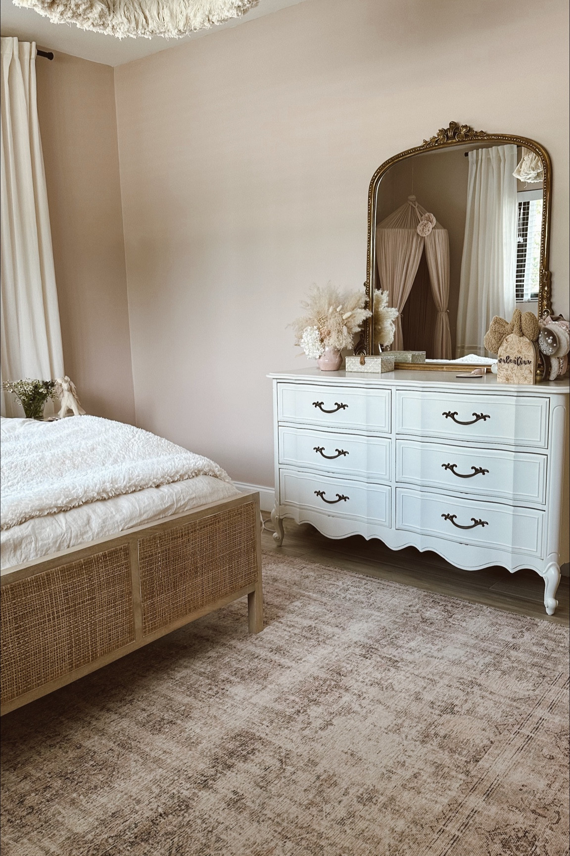 Girls bedroom decor #girlsbedroom #kidsbedroom #pinkbedroom #blushrug #kidsrug #arearug #loloirug #anthromirror #goldmirror #vanity #canebed #potterybarn #pampas #anthropologie #mirror #kidsdecor #kidsroom 

#LTKkids #LTKhome #LTKunder100