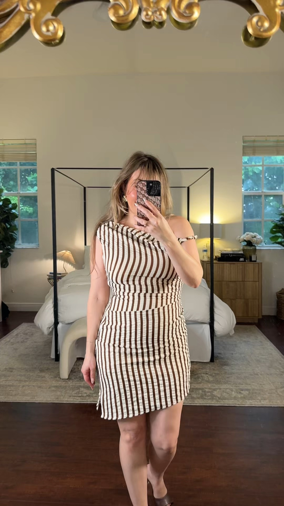 Love the fit and asymmetrical neckline on this mini dress!